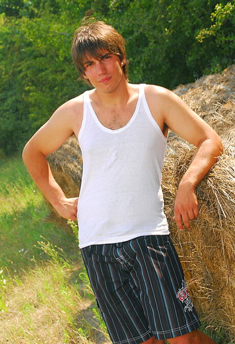 Hunk Rick Boy posing nude and showing tight butt outside