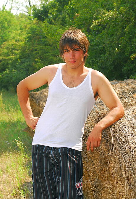 Hunk Rick Boy posing nude and showing tight butt outside