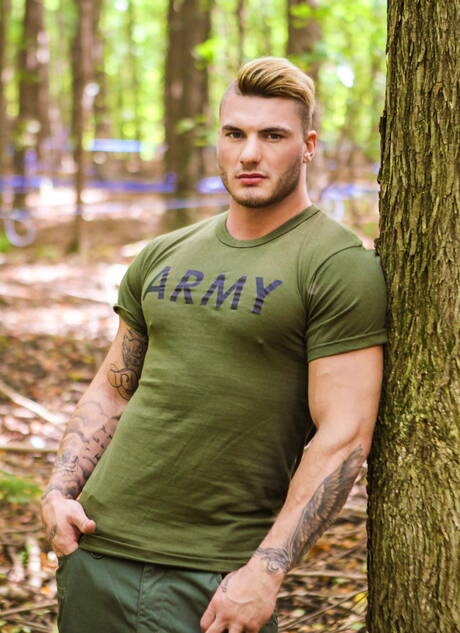 Twink Bellamy Bradley posing outdoors in uniform and getting fucked