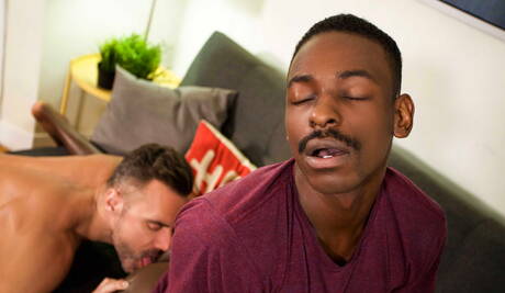 Black hunky guy River Wilson and canadian hunk Manuel Skye in black on white anal sex