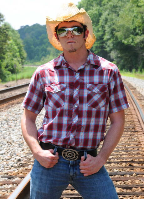 American superstud Johnny Rapid and strongman Robbie Rivers have a hot sex outside