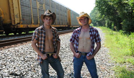 American superstud Johnny Rapid and strongman Robbie Rivers have a hot sex outside