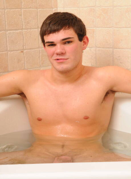 Hunky guy Phat Daddy and american young boy Leon Knight wanking in bathroom