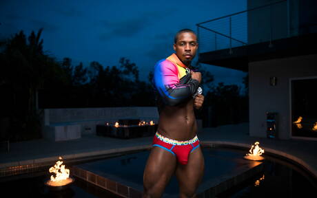 Ebony well-built Deangelo Jackson shows a strong body at pool