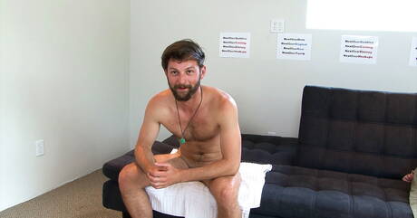 Hunky guy Andre Grey teasing with dildo