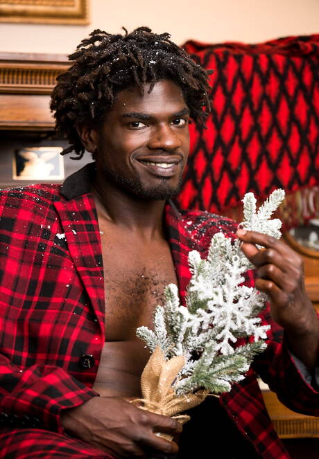 Ebony beefy Devin Trez shows a muscle body