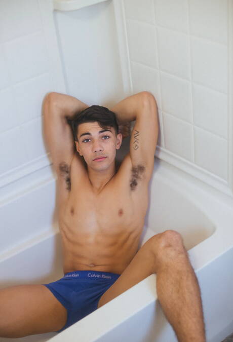 American young Alex Riley posing nude and showing hot butt in bath