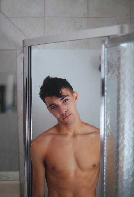 American young Alex Riley posing nude and showing hot butt in bath