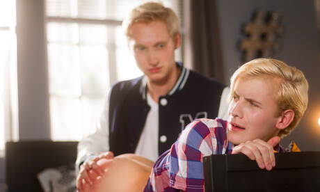 American beefy Max Carter and young Adam Hunt in butt spanking