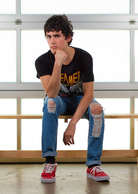 Latin pretty boy Xavier Ryan masturbating