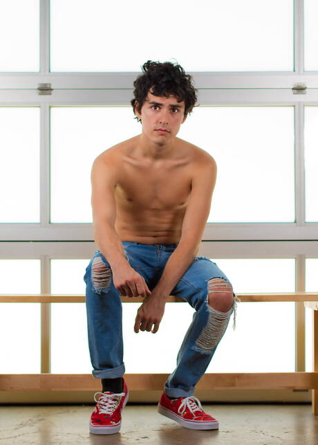 Latin pretty boy Xavier Ryan masturbating