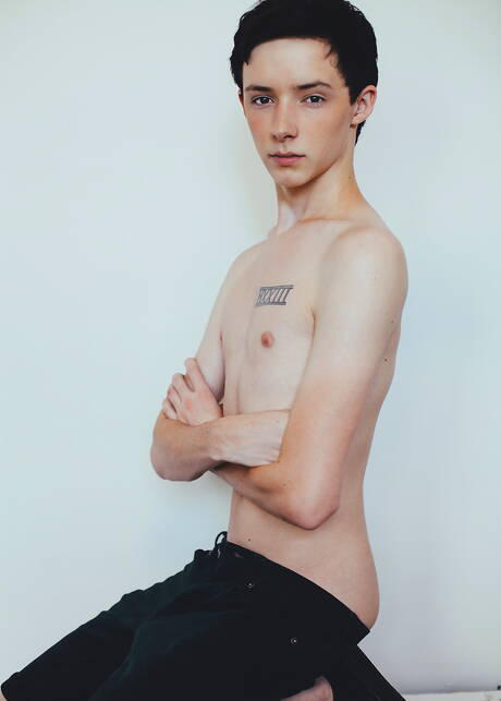 Helix Studios: American young Davey Brooks posing nude and showing tight butt