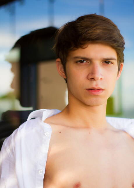 Latino young boy Adrian Rivers get naked and showing his ass outside