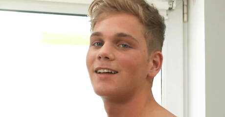 Swedish hunky guy Lars Norgaard undressing and showing tight ass