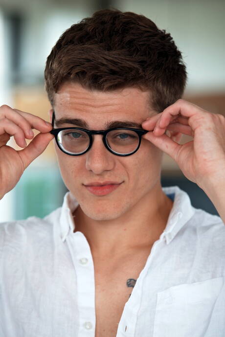 American beefcake Blake Mitchell playing with cock outdoor