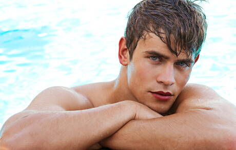 Czech hunky guy Dolph Lambert undressing and showing tight ass at the pool