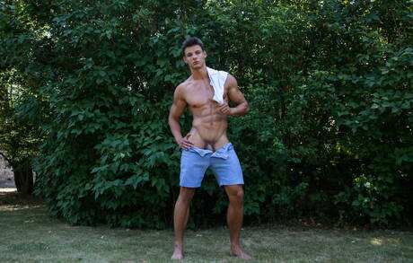 Russian stud Andrei Karenin posing nude and showing hot butt outside