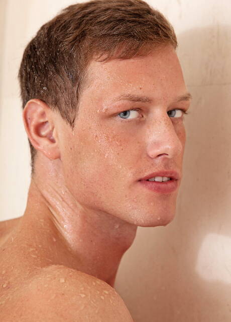 Czech muscular Brian Jovovich undressing and showing hot butt in hot shower