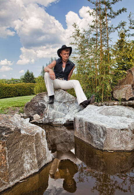 Hungarian young dude Tom Pollock undressing and showing hot butt in the pool