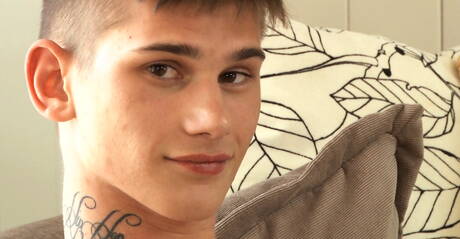 Beautiful boy Taylor Robinson playing with cock