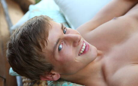 Czech beefcake Kevin Warhol posing nude and showing his butt outside