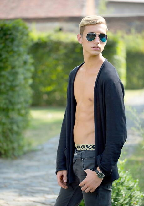 Czech twink Christopher Caan undressing and showing his ass outside