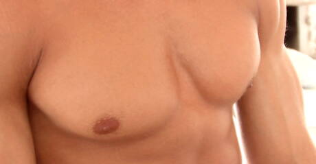 American beefcake Kris Evans playing with cock