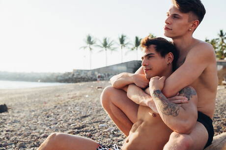 Hot american boys stud Levi Karter and husky guy Troy Accola in hot anal sex on beach