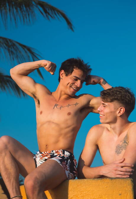 Hot american boys stud Levi Karter and husky guy Troy Accola in hot anal sex on beach