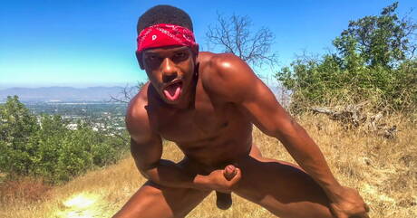 Black tough guy Adrian Hart jerking with toy outdoor