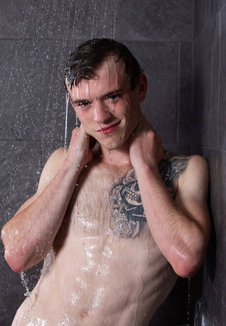 Next Door Studios: Alex Tanner and american strongman Scott Finn undressing and showing ass in hot shower