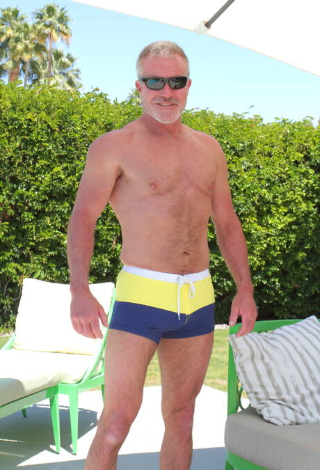 American mature bear Dale Savage undressing and showing nice butt outside