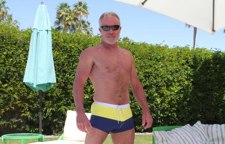 American mature bear Dale Savage undressing and showing nice butt outside