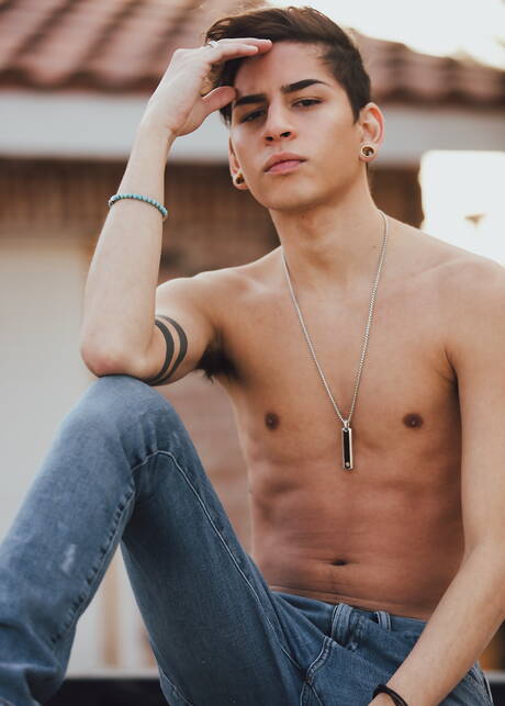 Latino young boy Aiden Garcia get naked and showing his ass outside