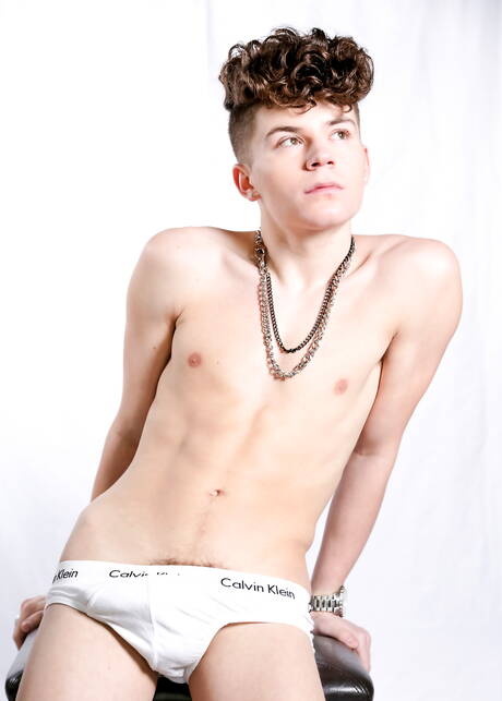 American twink Silas Brooks posing nude outside
