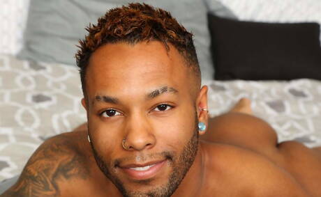 Black muscular Pharaoh Beckham shows a sturdy body