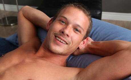 Hot twink Kyle Bryant undressing and showing tight butt