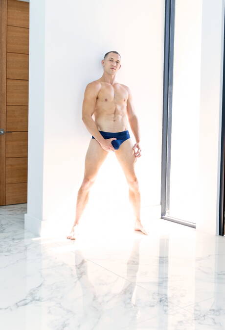 British beefy Michael Boston and  Ethan Sinns fuck ass after sucking cock in bathroom