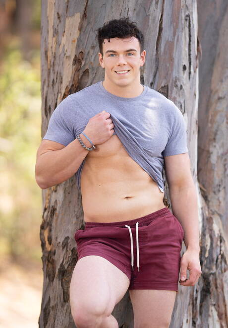 American bodybuilder Clark Reid shows a husky body outside