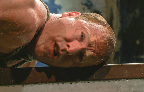 Strongman Derek Pain in bondage sex scene