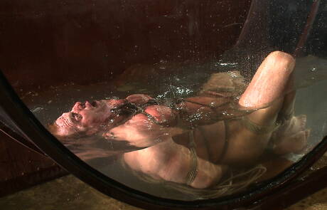 Strongman Derek Pain in bondage sex scene