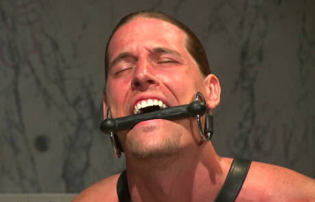 American muscular Kip Johnson in hard bdsm sex scene
