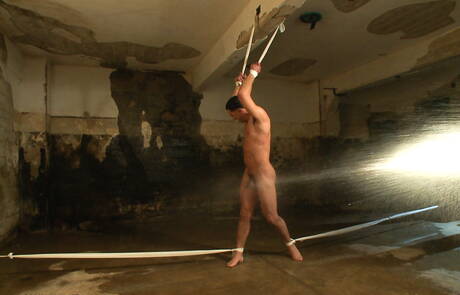 American husky guy Andrew Fitch in bondage porn scene