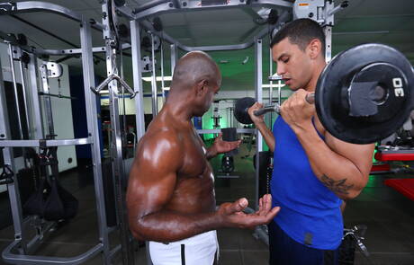 Hunky guy Leo Silva and black muscular Aaron Trainer in black on white sex