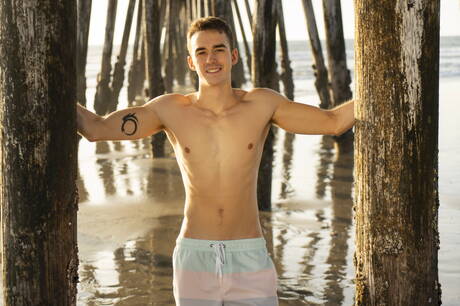 Superstud Will shows a perfect body on beach