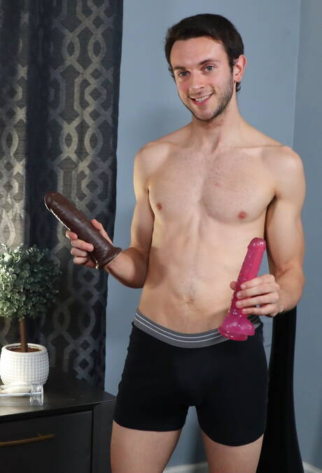 American twink Izzy Danger teasing with sex toy