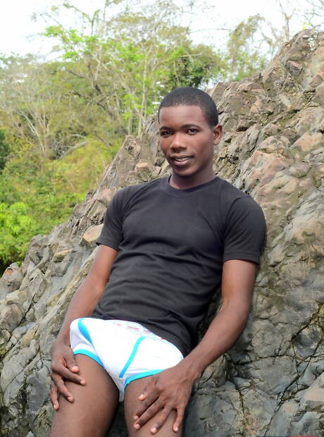 Ebony strongman Devon Lebron and american young dude Lucas Owens in black on white love outdoor