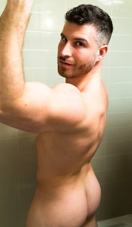 Muscular Ryan Ellis posing naked and showing hot ass in shower