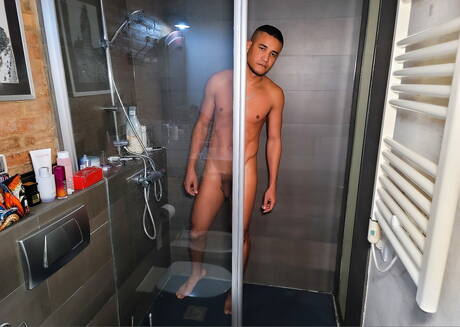 Canadian stud Romeo Davis and beefy Rudalo in blowjob scene in bathroom