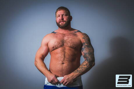 American mature bear Colby Jansen and latin bodybuilder Jonah Fontana have anal sex